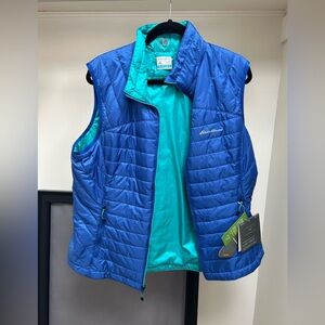 NWT Eddie Bauer Reversible Blue and Green/Teal Vest. Size XL. Brand new with tag